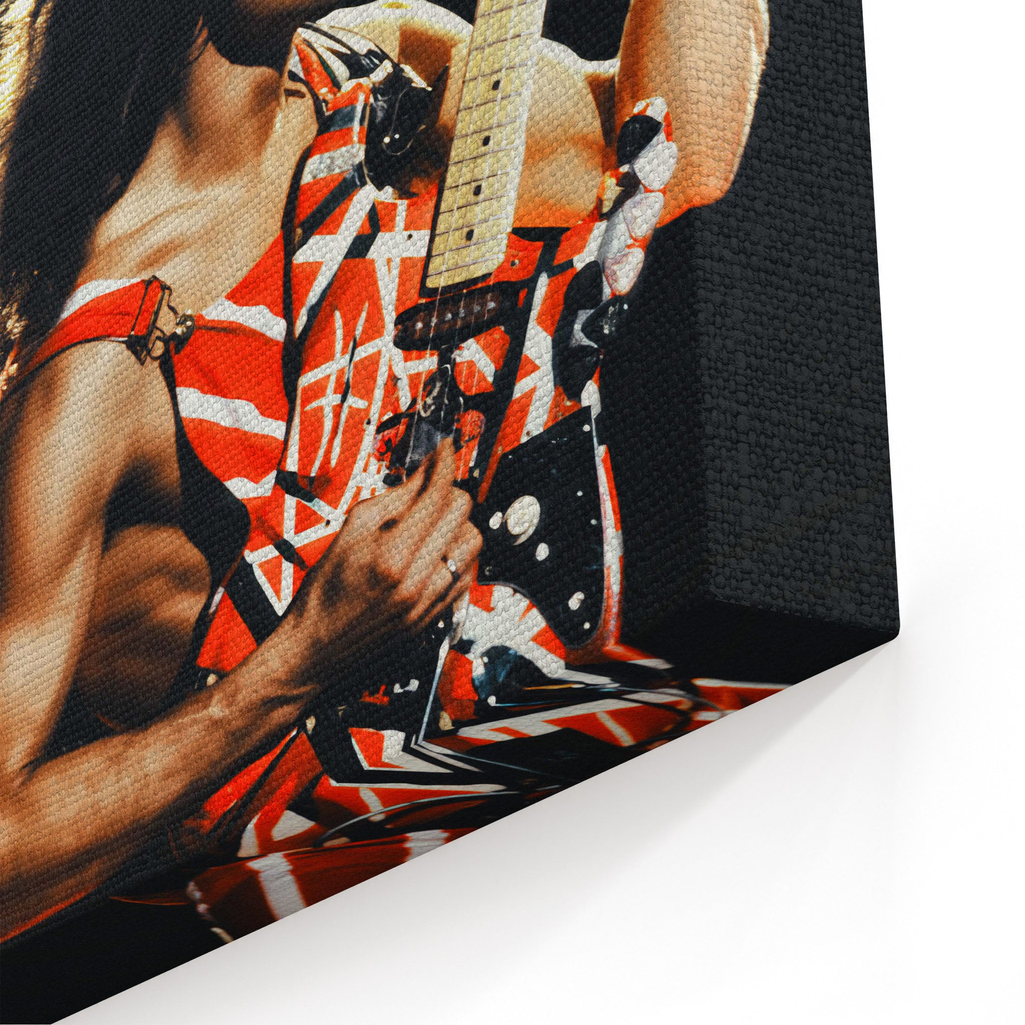 Close-up texture shot of studio-thick archival canvas fabric texture and sharp print details on a gallery wrap edge.