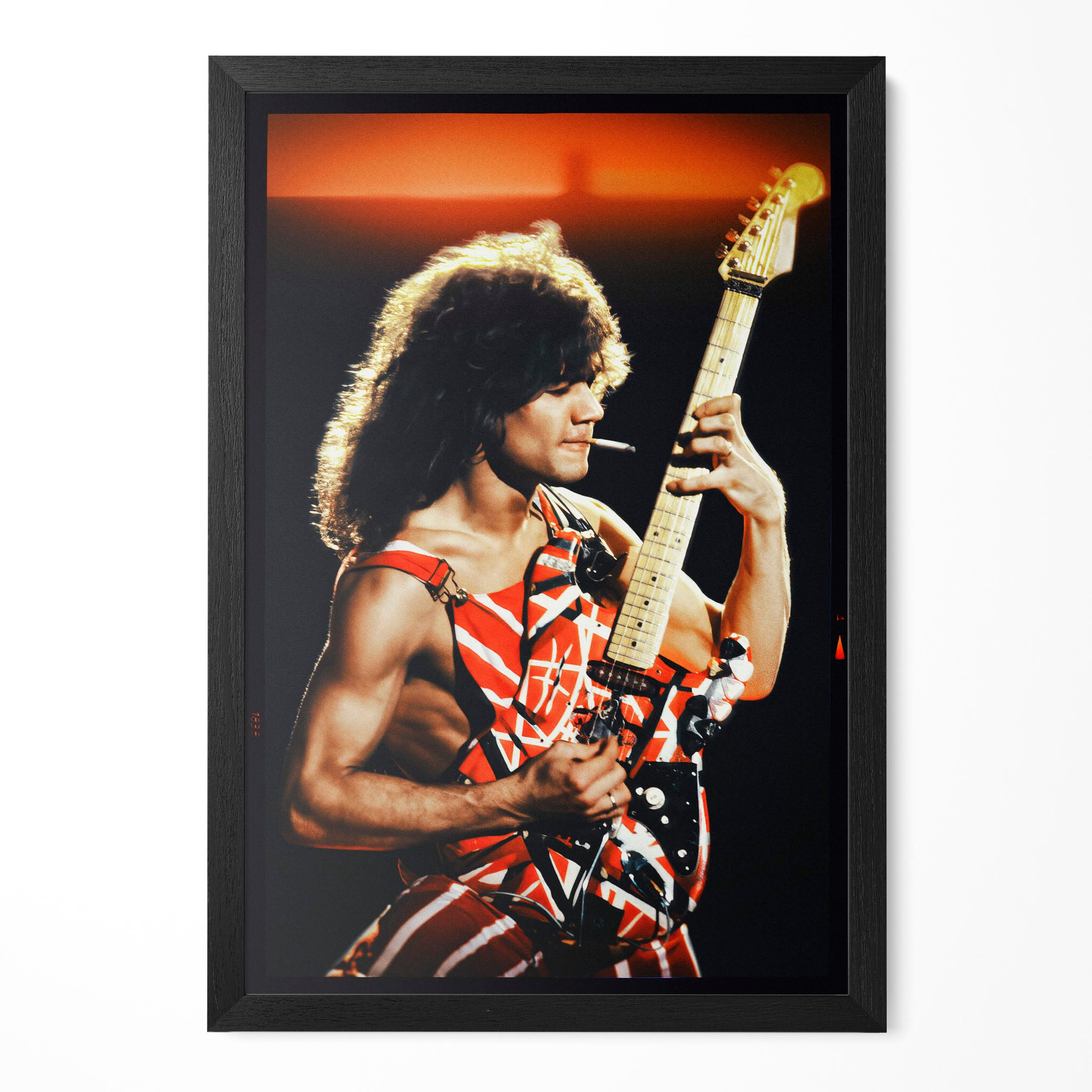 Full front view of the Eddie Van Halen 1982 Diver Down rock poster housed in a classic black wooden frame.