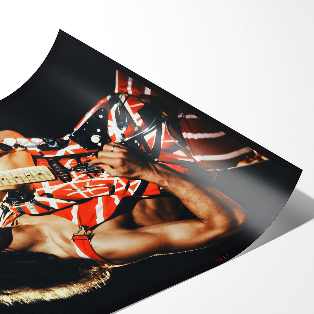 Close-up angled view of an unframed premium matte paper poster print of legendary guitarist Eddie Van Halen.