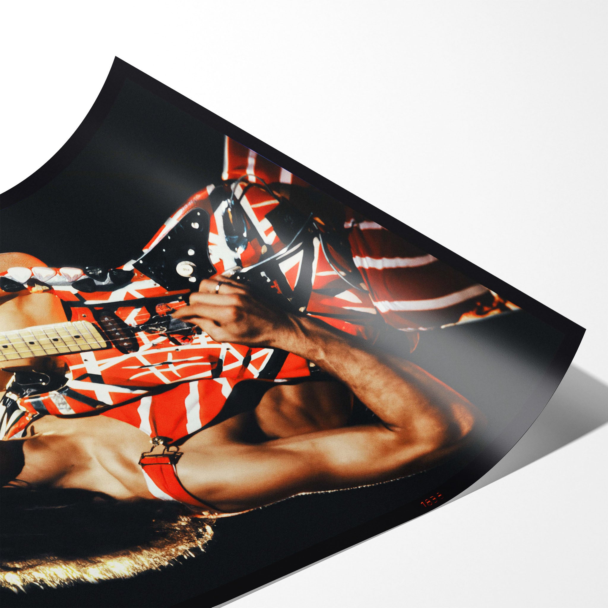 Close-up angled view of an unframed premium matte paper poster print of legendary guitarist Eddie Van Halen.