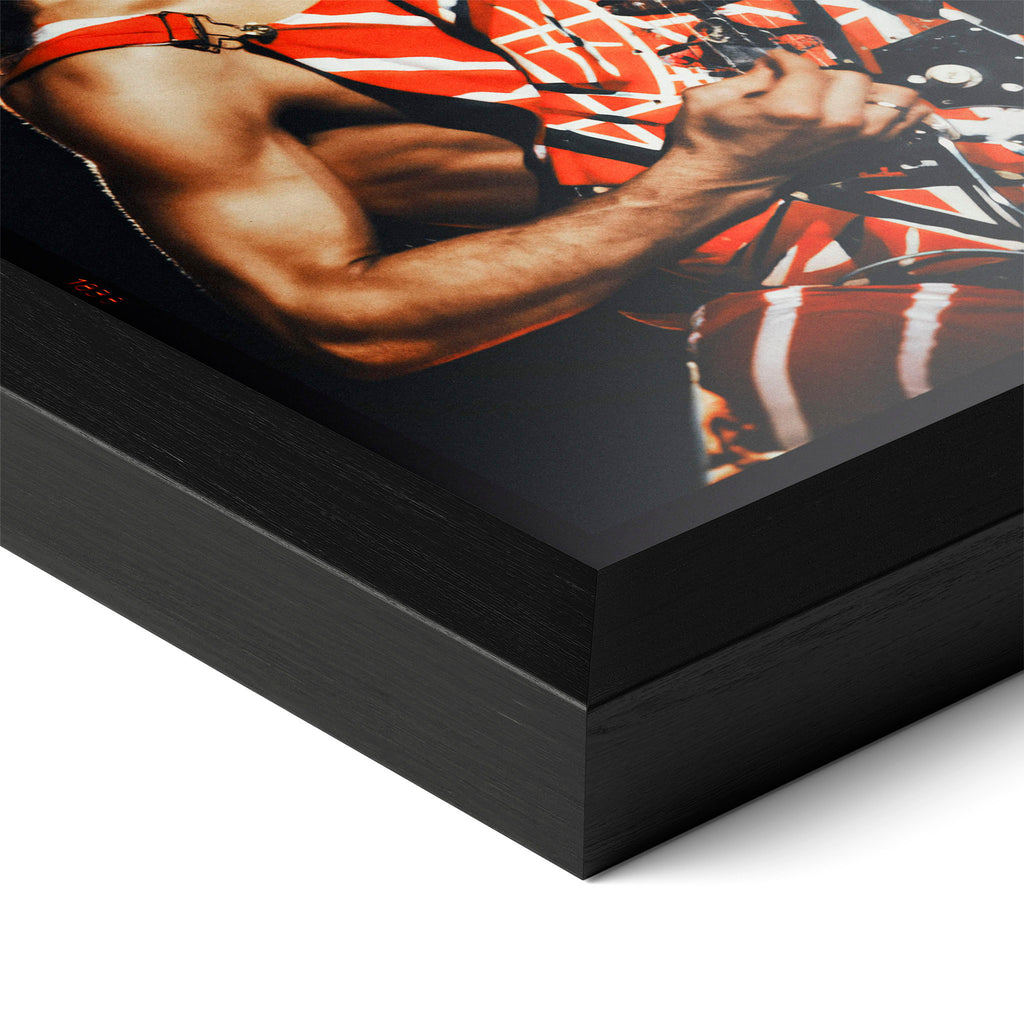 Detailed corner close-up of a premium black wooden picture frame holding the Eddie Van Halen vintage rock wall art.