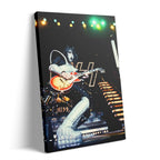 Premium gallery-wrapped color canvas print of Ace Frehley live with KISS at The Forum in 1977.