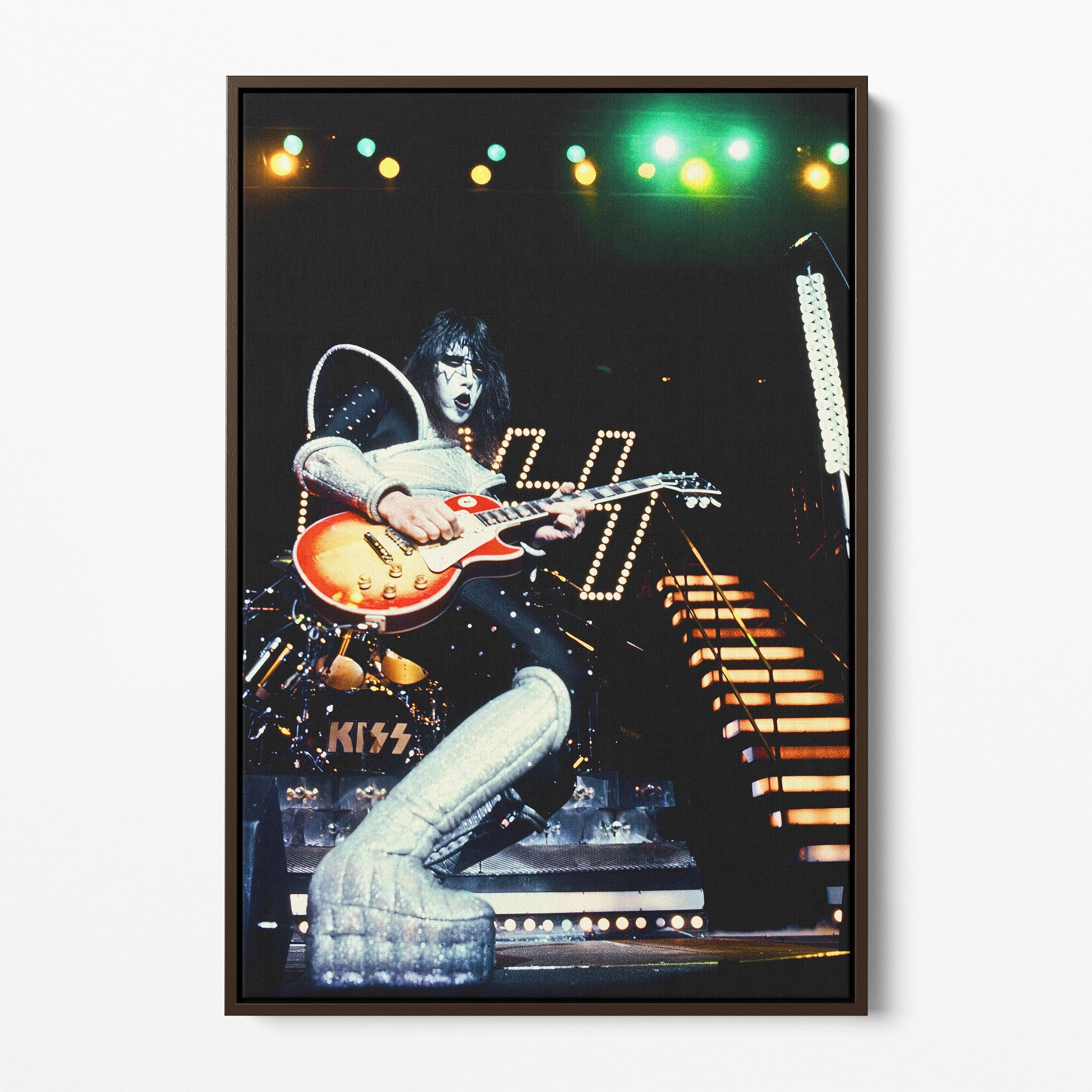 Front display of the Ace Frehley 1977 KISS color canvas in a premium dark walnut floating frame.
