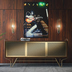 Sleek aluminum color metal print of Ace Frehley displayed over a mid-century modern credenza.