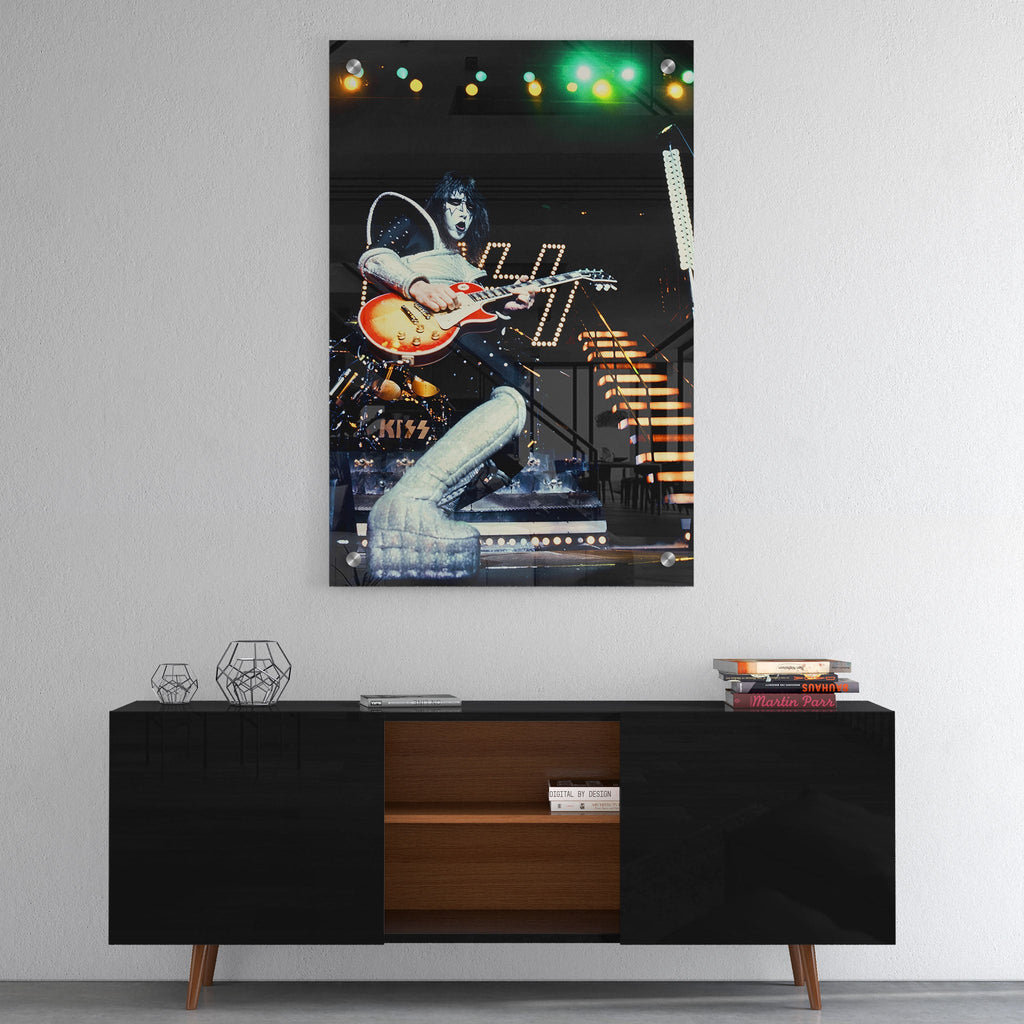 High-gloss acrylic glass color print of Ace Frehley displayed above a contemporary console.