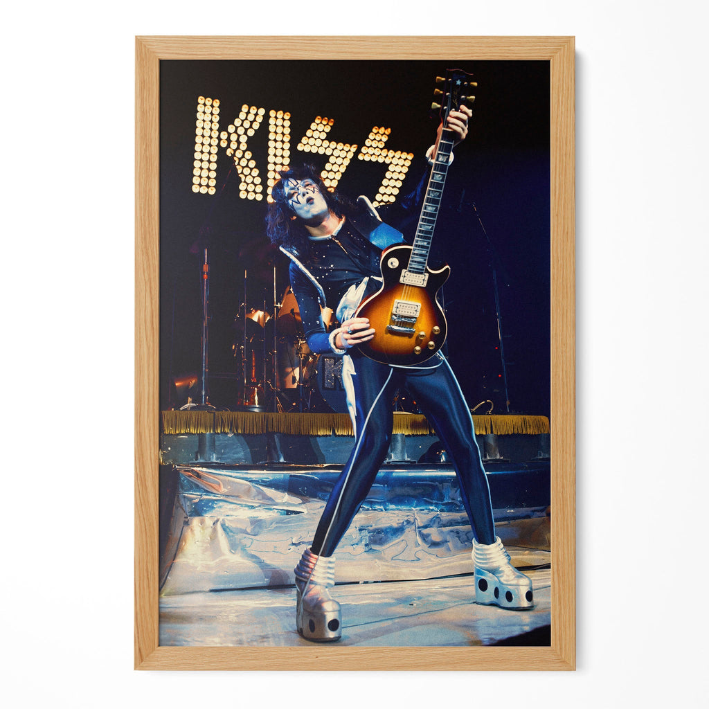 Ace Frehley 1977 KISS Japan live color guitar poster in a premium natural oak wood frame by POSTEREVER.
