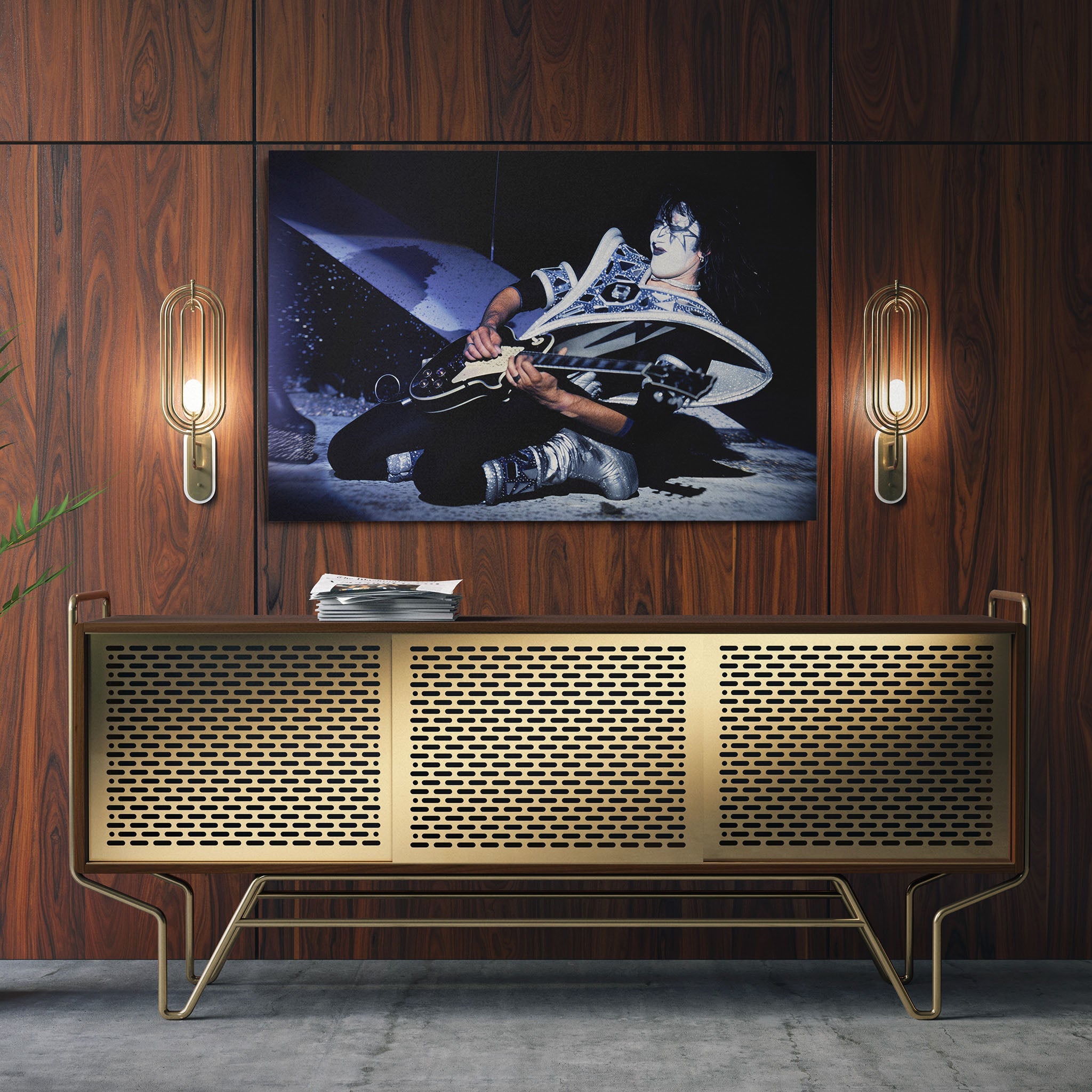 Sleek aluminum color metal print of Ace Frehley displayed over a mid-century modern credenza.
