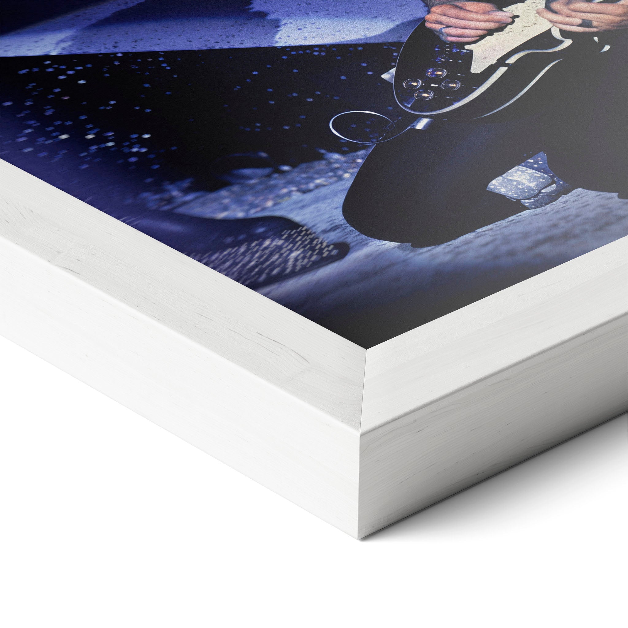 Corner close-up revealing the clean wood grain of the white framed Ace Frehley 1979 KISS color art print.
