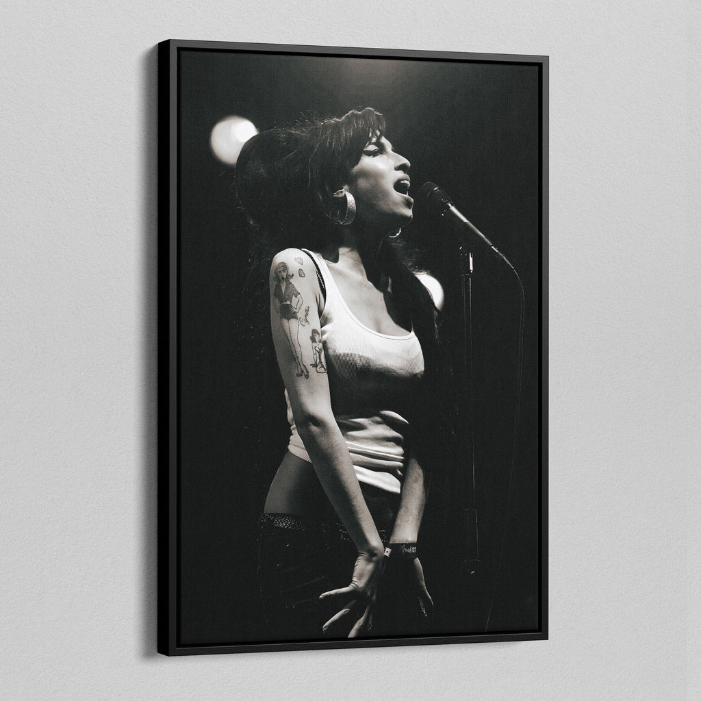 Side angle of the Amy Winehouse 2007 black and white canvas in a luxury minimalist black floating frame.