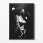 Front display of the Amy Winehouse 2007 black and white canvas in a premium natural wood floating frame.