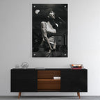 High-gloss acrylic glass black and white print of Amy Winehouse displayed above a contemporary console.