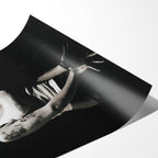 Angled close-up of the unframed premium matte black and white Amy Winehouse 2007 Hultsfred poster print.