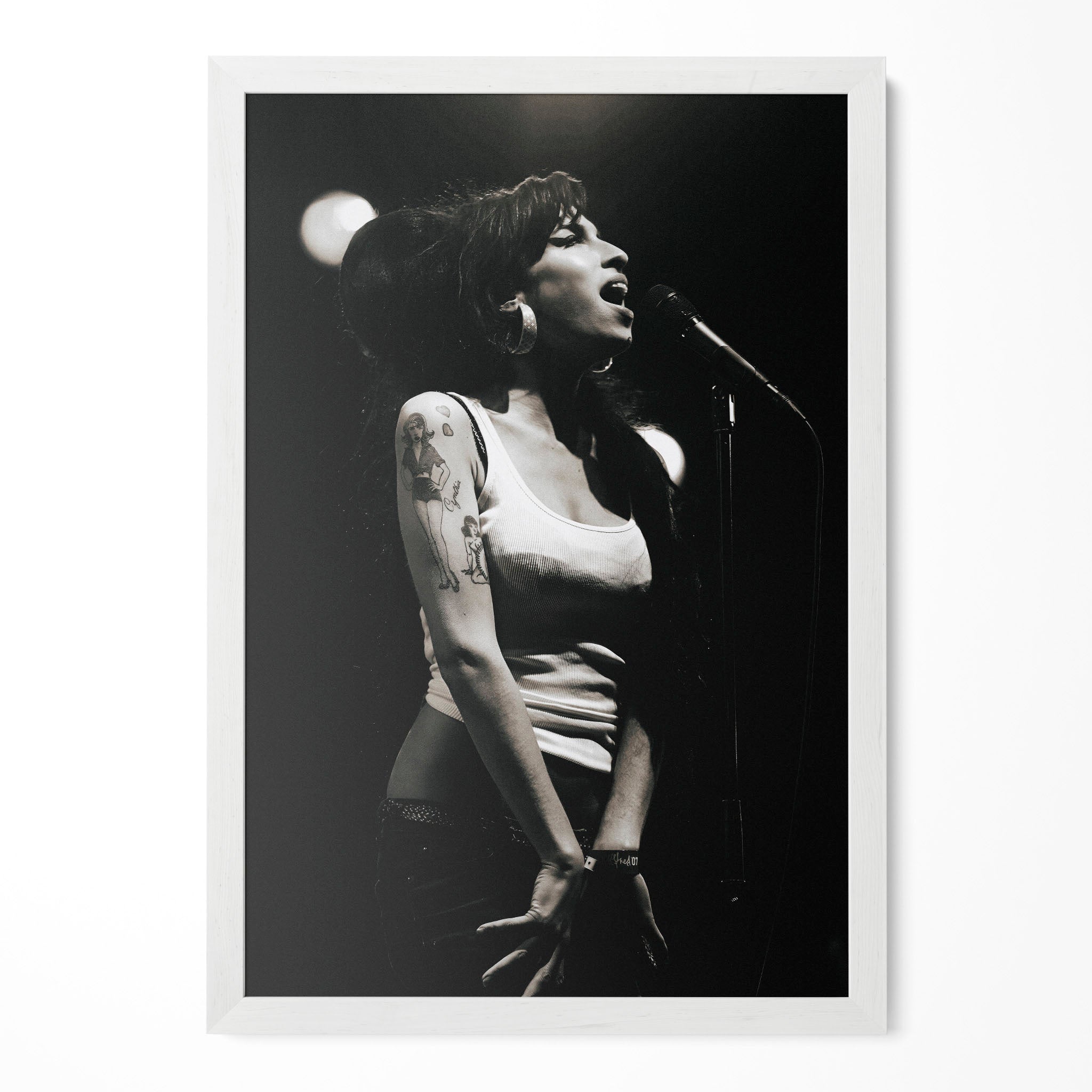 Amy Winehouse 2007 Hultsfred black and white poster in a modern minimalist white wooden frame by POSTEREVER.