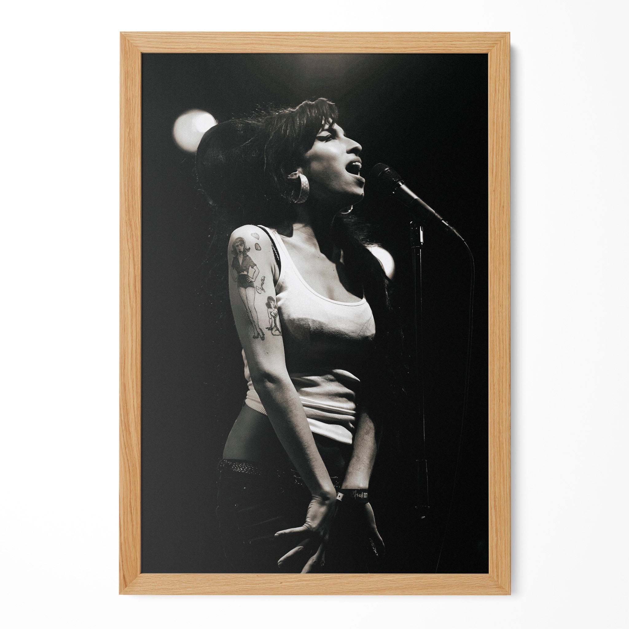 Amy Winehouse 2007 Hultsfred black and white poster in a premium natural oak wood frame by POSTEREVER.