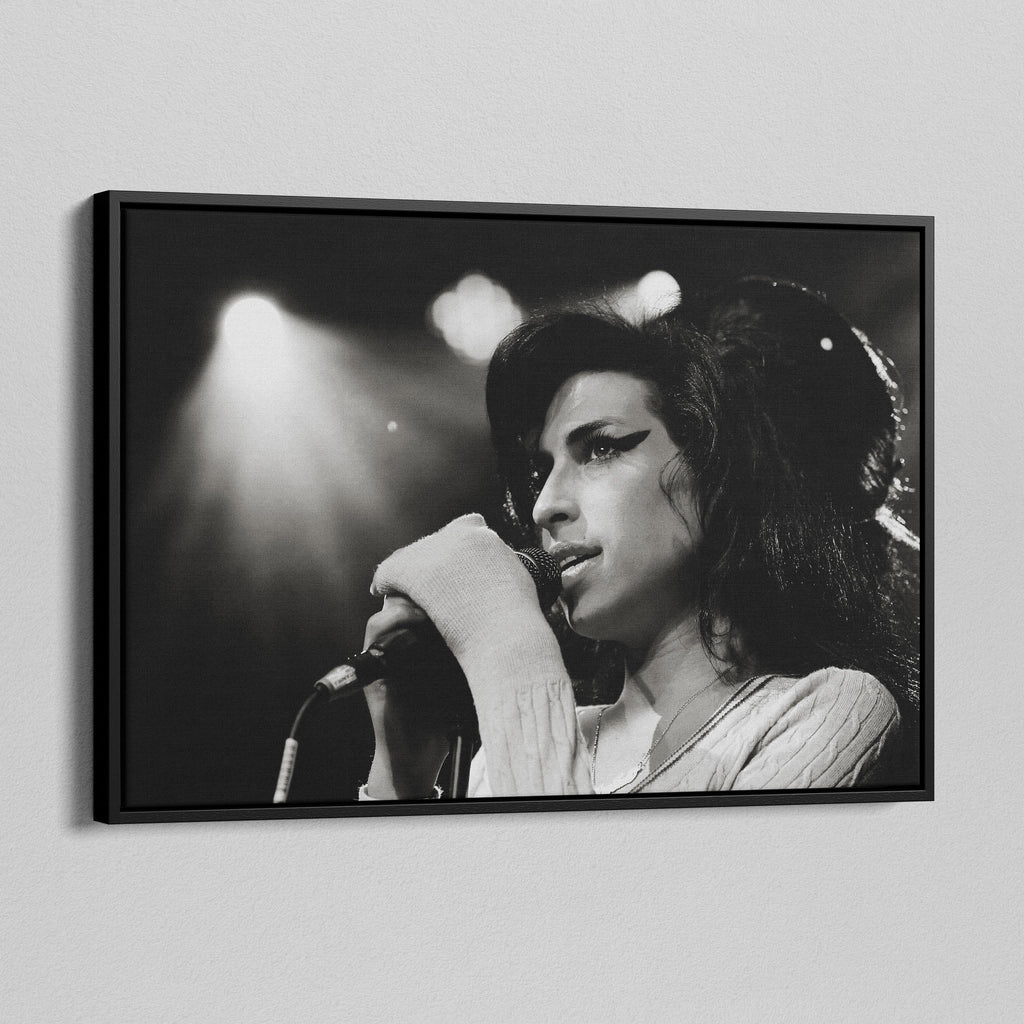 Side angle of the Amy Winehouse 2007 black and white canvas in a luxury minimalist black floating frame.