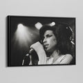 Side angle of the Amy Winehouse 2007 black and white canvas in a luxury minimalist black floating frame.