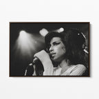 Front display of the Amy Winehouse 2007 black and white canvas in a premium dark walnut floating frame.