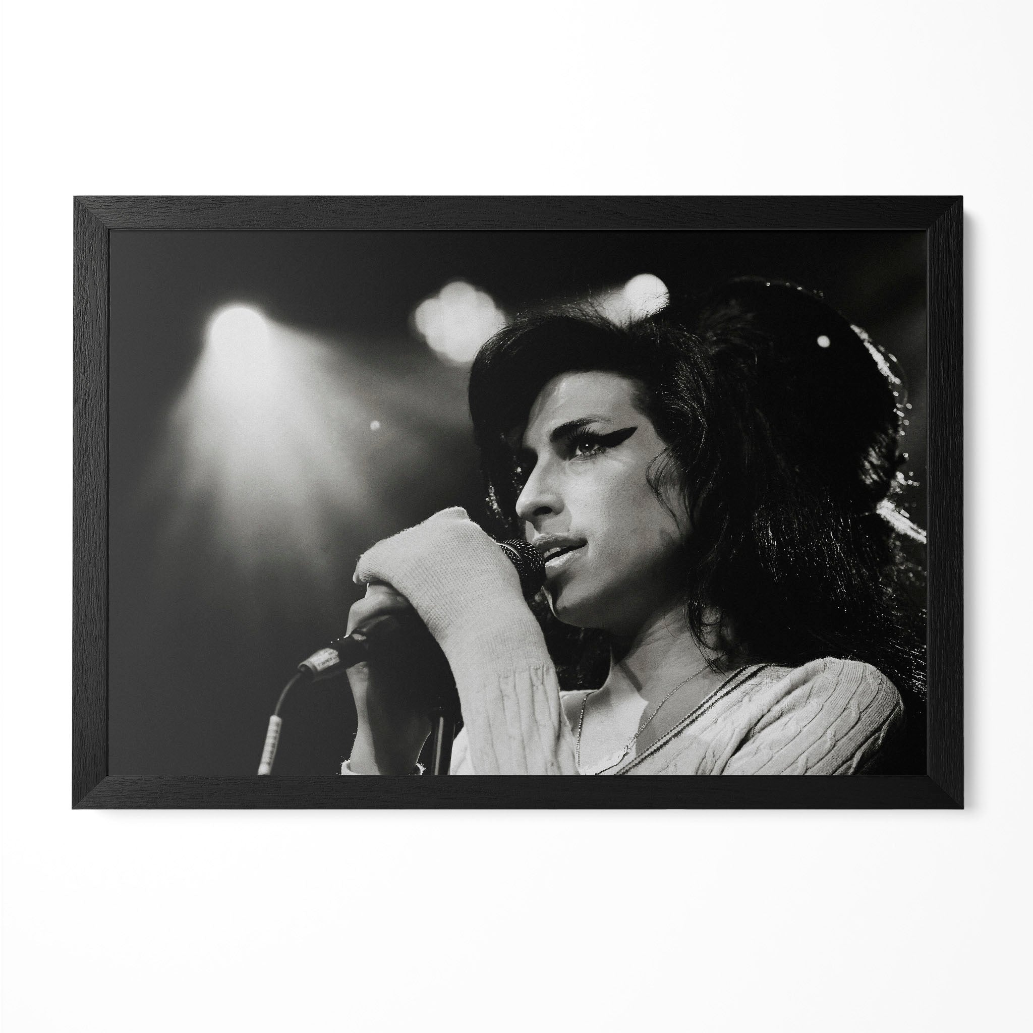 Amy Winehouse 2007 Zurich black and white live concert poster in a premium classic black wooden frame by POSTEREVER.