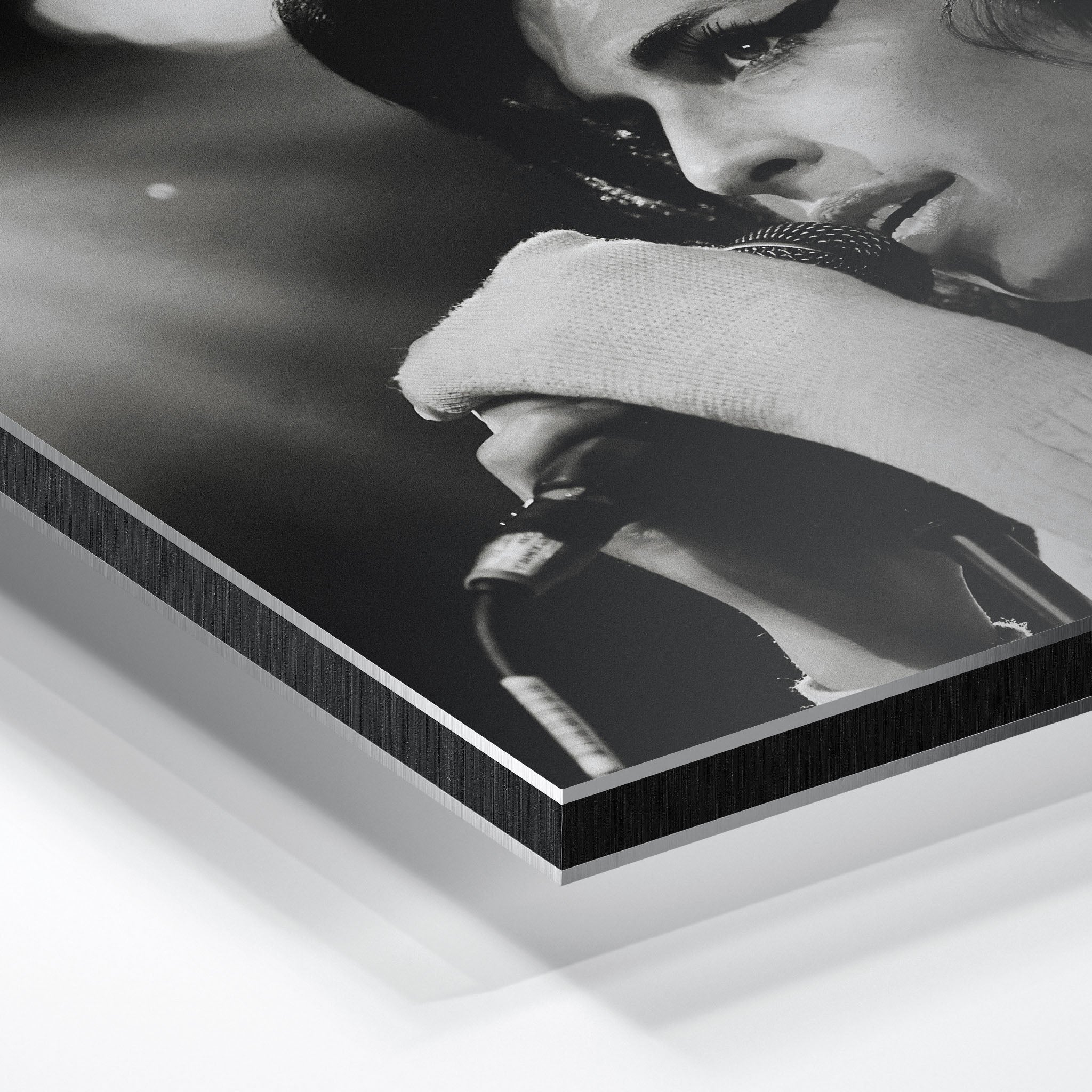 Macro close-up of the ultra-thin aluminum DIBOND panel edge of the Amy Winehouse 2007 black and white metal print.