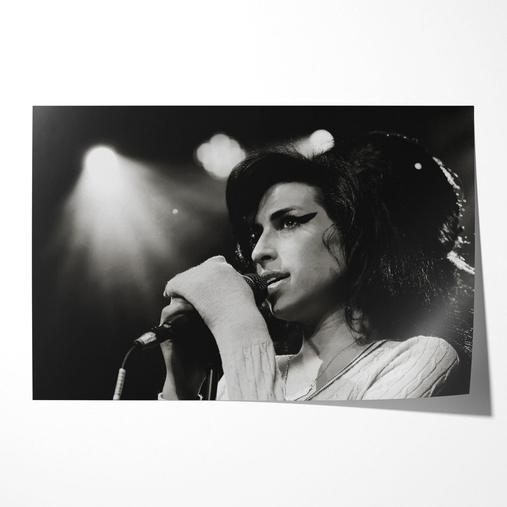 Unframed black and white Amy Winehouse Back to Black era 2007 Zurich Volkshaus concert poster print with her signature beehive and cat-eye.