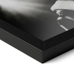 Detailed corner close-up of the premium black wooden frame holding the Amy Winehouse 2007 black and white concert poster.