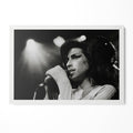 Amy Winehouse 2007 Zurich black and white poster in a modern minimalist white wooden frame by POSTEREVER.