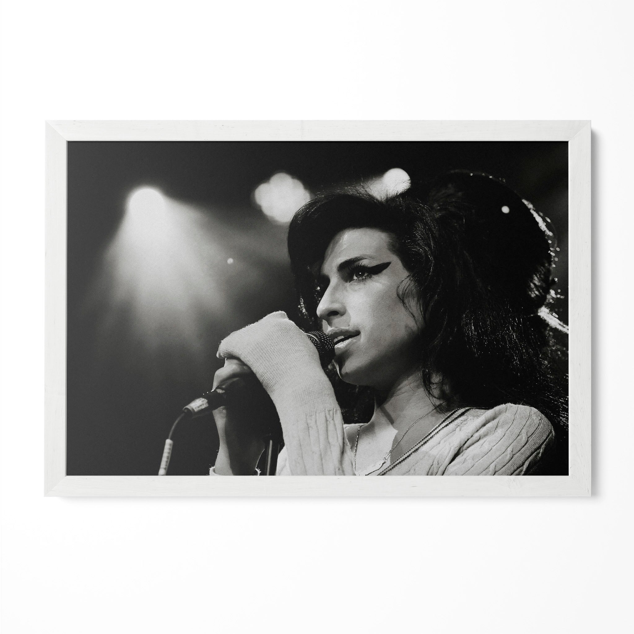 Amy Winehouse 2007 Zurich black and white poster in a modern minimalist white wooden frame by POSTEREVER.