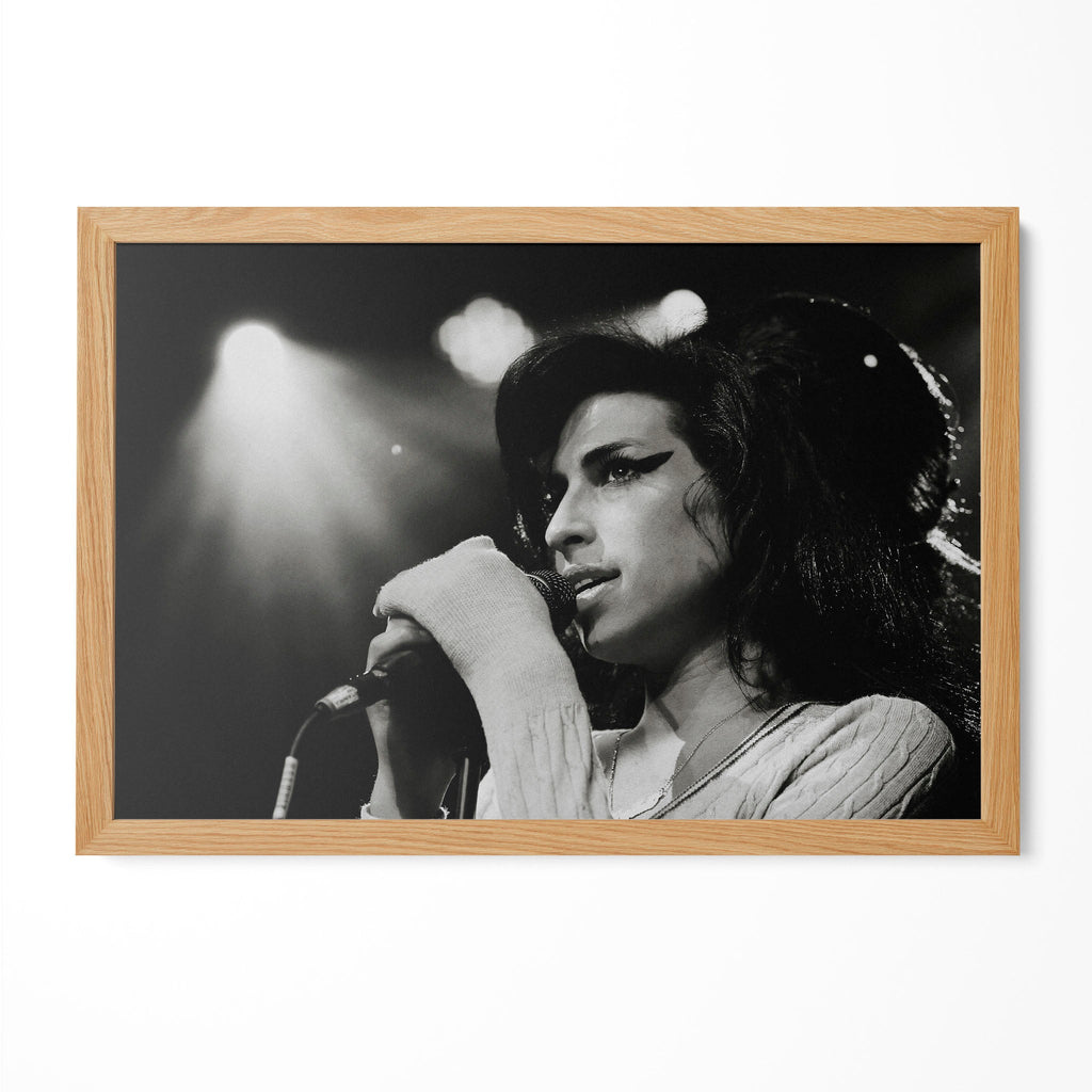 Amy Winehouse 2007 Zurich black and white poster in a premium natural oak wood frame by POSTEREVER.