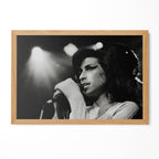 Amy Winehouse 2007 Zurich black and white poster in a premium natural oak wood frame by POSTEREVER.