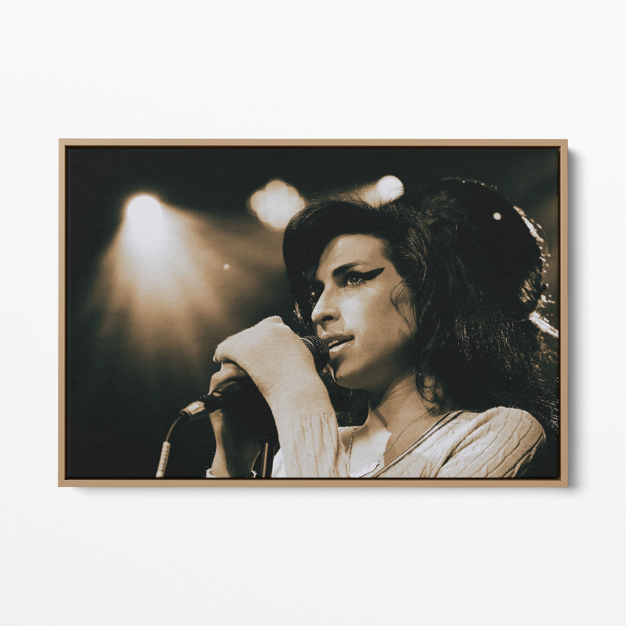 Front display of the Amy Winehouse 2007 color canvas in a premium natural wood floating frame.