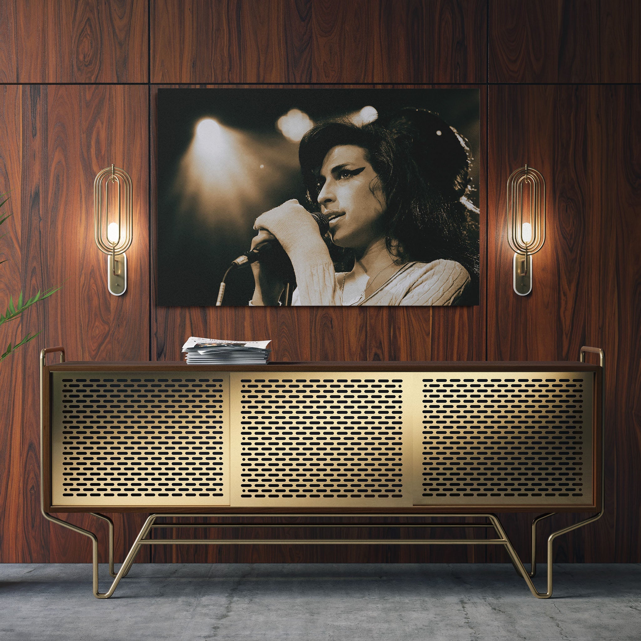 Sleek aluminum color metal print of Amy Winehouse displayed over a mid-century modern credenza.