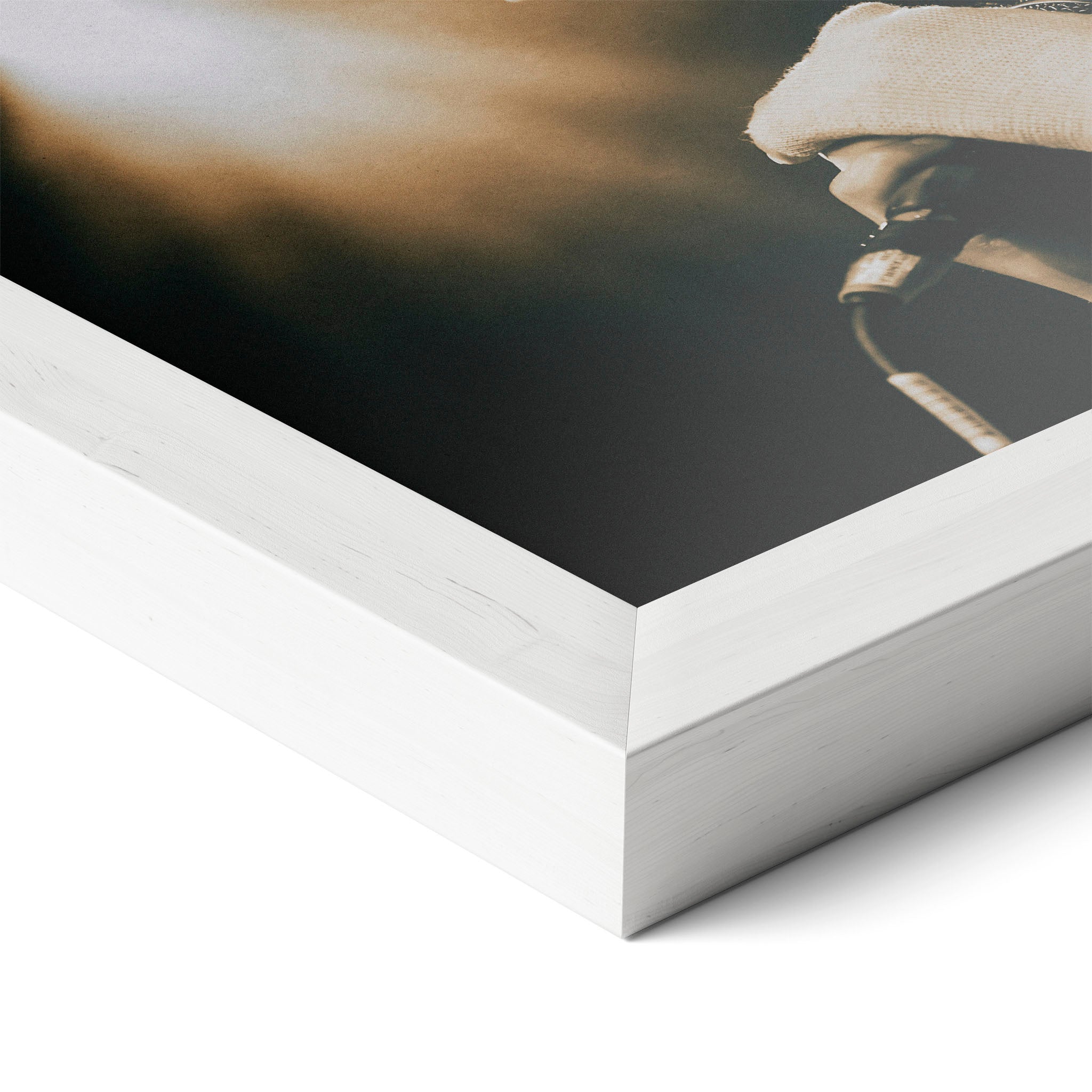 Corner close-up revealing the clean wood grain of the white framed Amy Winehouse 2007 color art print.