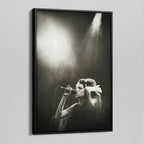 Side angle of the Amy Winehouse black and white canvas in a luxury minimalist black floating frame.
