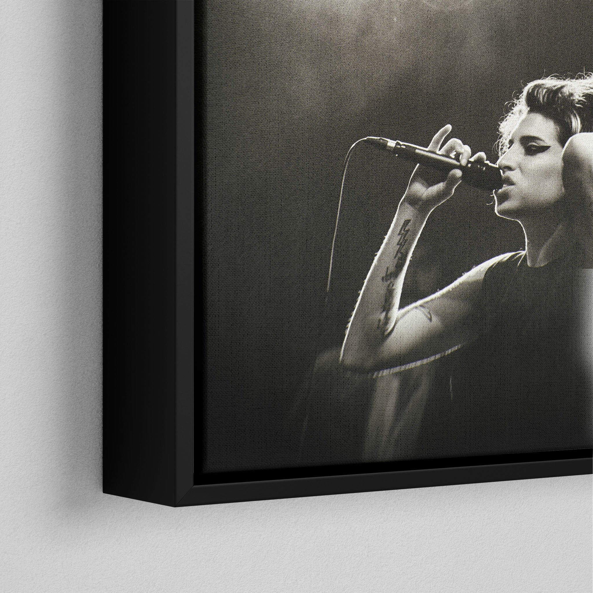 Corner macro of the elegant floating gap and fine finish of the black floating canvas frame.
