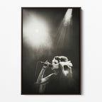 Front display of the Amy Winehouse black and white canvas in a premium dark walnut floating frame.