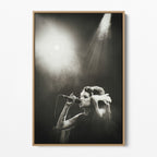 Front display of the Amy Winehouse black and white canvas in a premium natural wood floating frame.