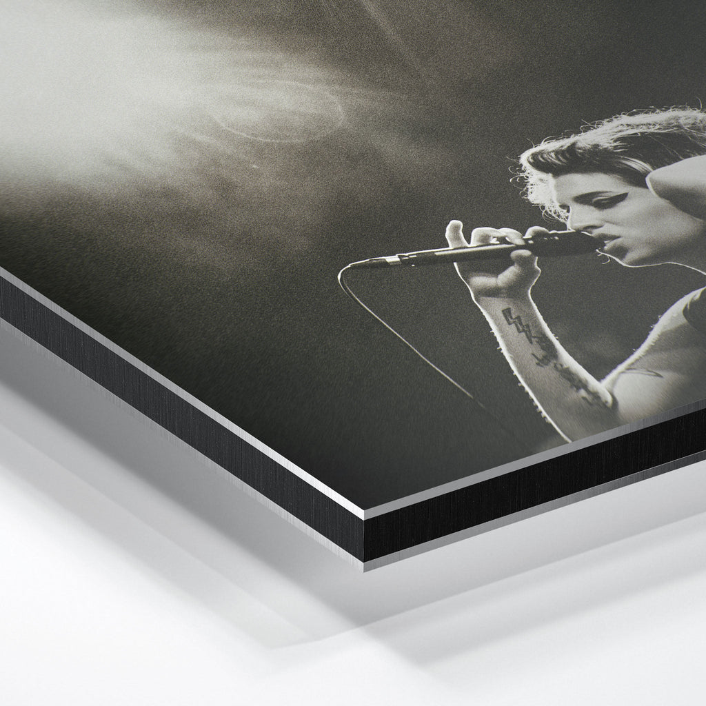 Macro close-up of the ultra-thin aluminum DIBOND panel edge of the Amy Winehouse black and white metal print.