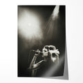 Unframed black and white Amy Winehouse Back to Black era live concert poster print with her signature beehive and cat-eye under spotlights.