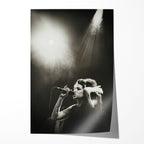 Unframed black and white Amy Winehouse Back to Black era live concert poster print with her signature beehive and cat-eye under spotlights.