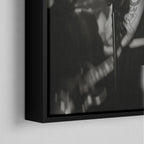Corner macro of the elegant floating gap and fine finish of the black floating canvas frame.