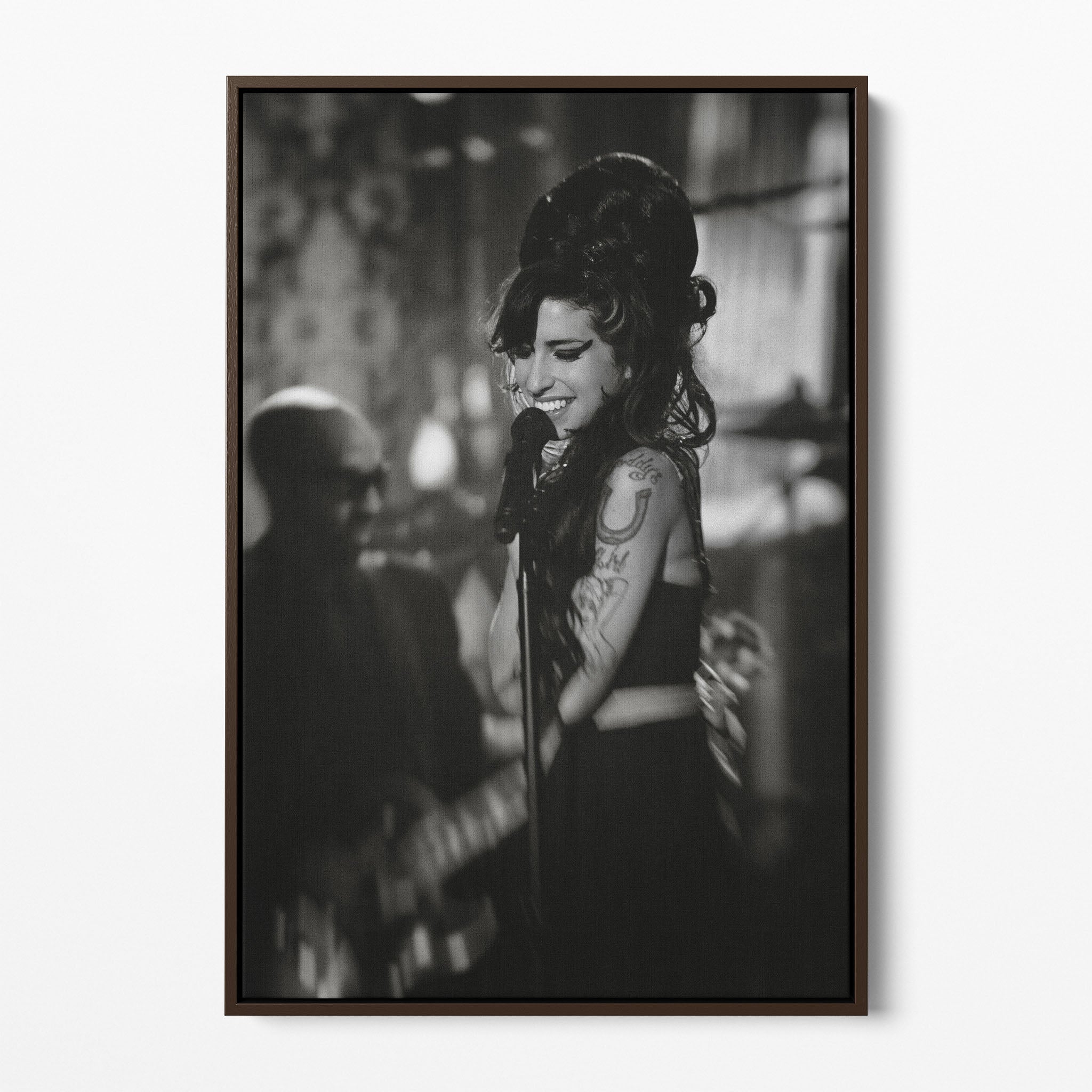 Front display of the Amy Winehouse 2008 Grammys black and white canvas in a premium dark walnut floating frame.