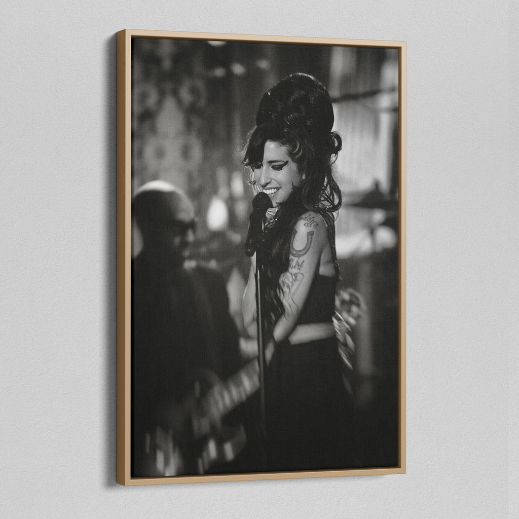 Angled view of the black and white canvas in a modern natural oak wood floating frame.