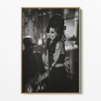 Front display of the Amy Winehouse 2008 Grammys black and white canvas in a premium natural wood floating frame.