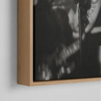 Corner close-up of the floating gap and grain texture of the natural wood canvas frame.