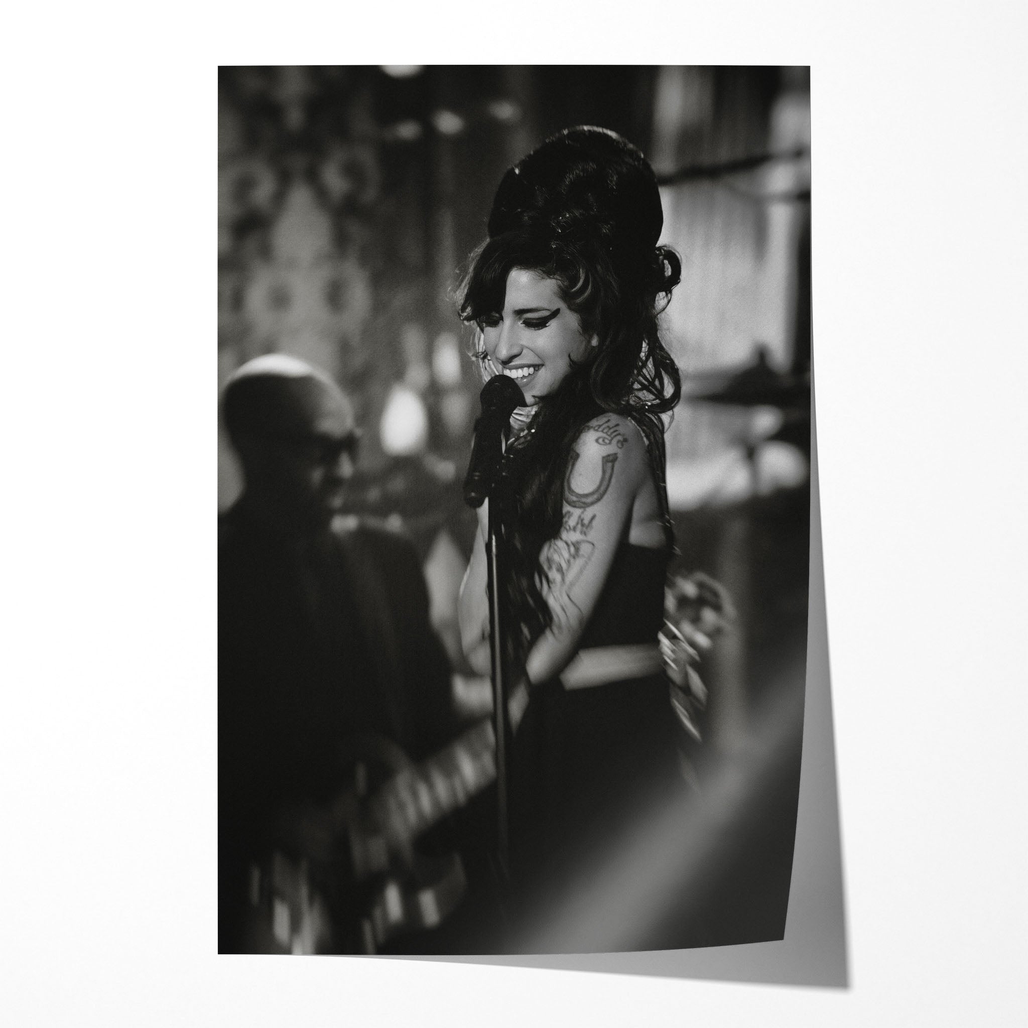 Unframed black and white Amy Winehouse 2008 Grammy Awards Riverside Studios concert poster print, smiling with her signature beehive.