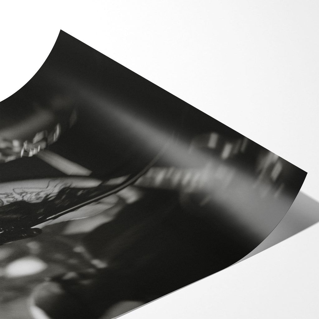 Angled close-up of the unframed premium matte black and white Amy Winehouse 2008 Grammys poster print.