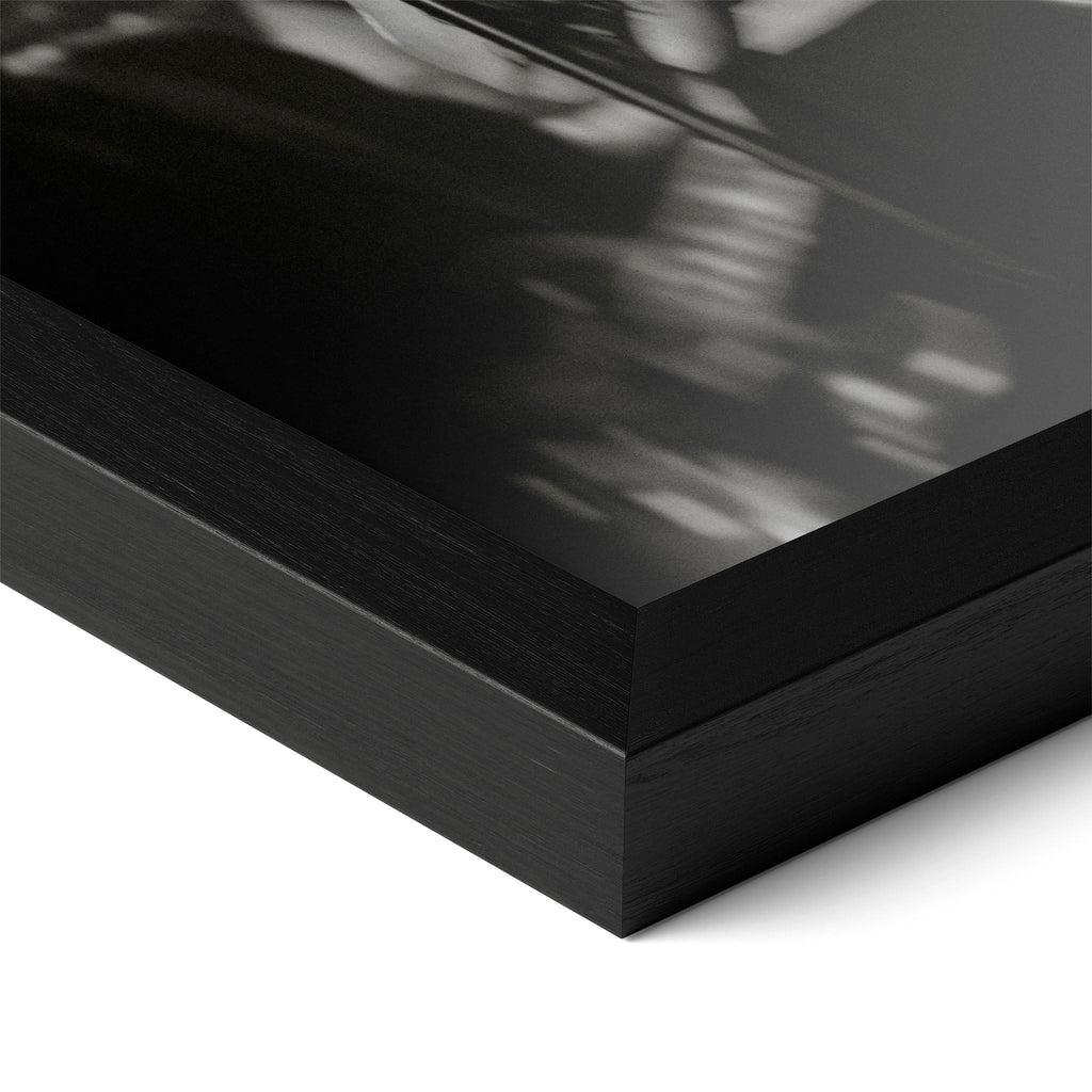 Detailed corner close-up of the premium black wooden frame holding the Amy Winehouse 2008 Grammys black and white poster.