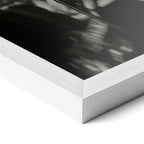 Corner close-up revealing the clean wood grain of the white framed Amy Winehouse 2008 Grammys black and white art print.