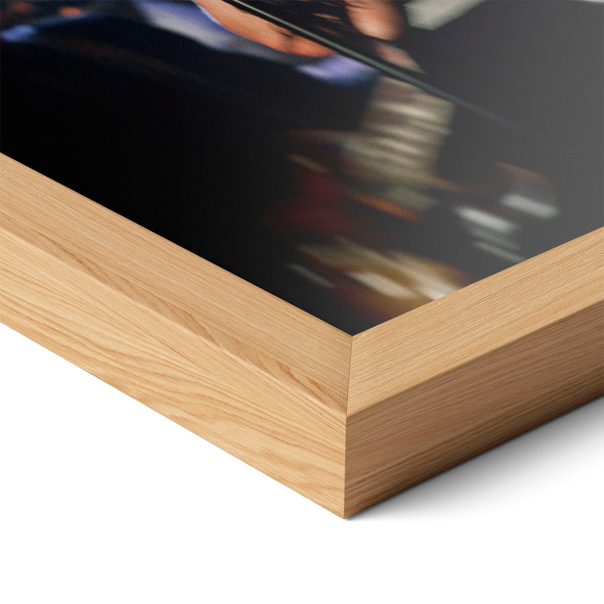 Corner close-up highlighting the natural oak finish of the framed Amy Winehouse 2008 Grammys color poster.