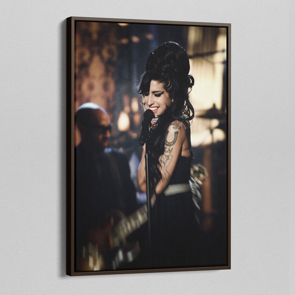 Angled view of the Amy Winehouse 2008 Grammys color canvas in a sophisticated dark walnut floating frame.